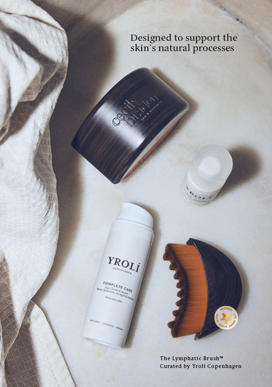 A5-plakat: The Lymphatic Brush, curated by Yrolí Copenhagen. Designed to support the skin's natural processes.